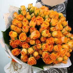 Sunset Whispers” – 150 Orange Spray Roses in Vintage Newspaper Wrap