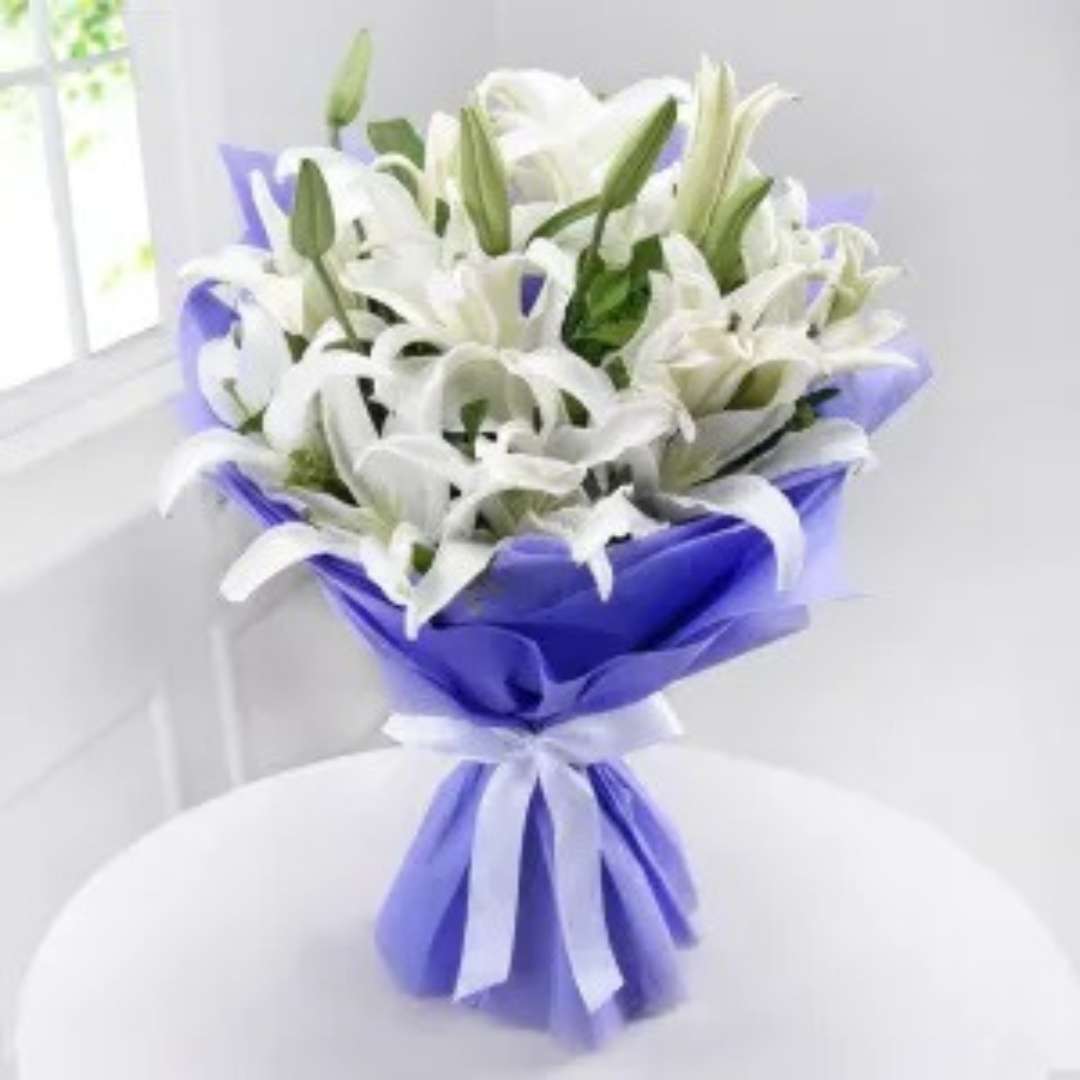 Twilight Offering – 10 White Oriental Lilies in Purple Non-Woven Wrap